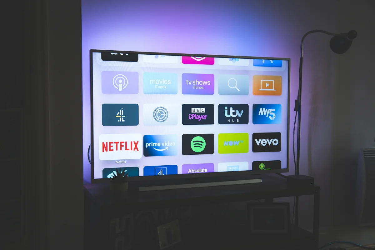 black flat screen tv turned on showing game - iptv abonnement