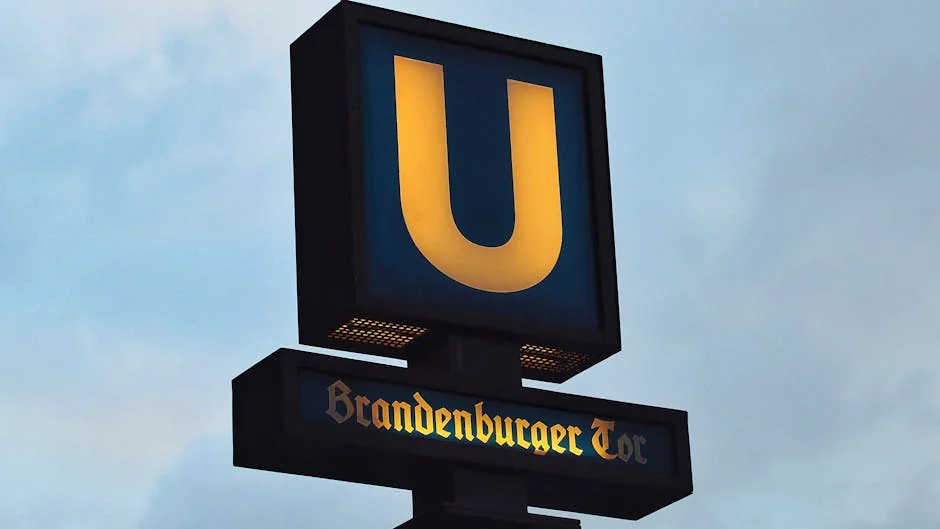 U-Bahn sign at Brandenburger Tor station in Berlin, Germany against a cloudy sky. - iptv deutschland