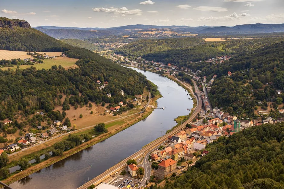 Explore the breathtaking aerial view of the Elbe River winding through the scenic landscape of Saxony. - iptv deutschland