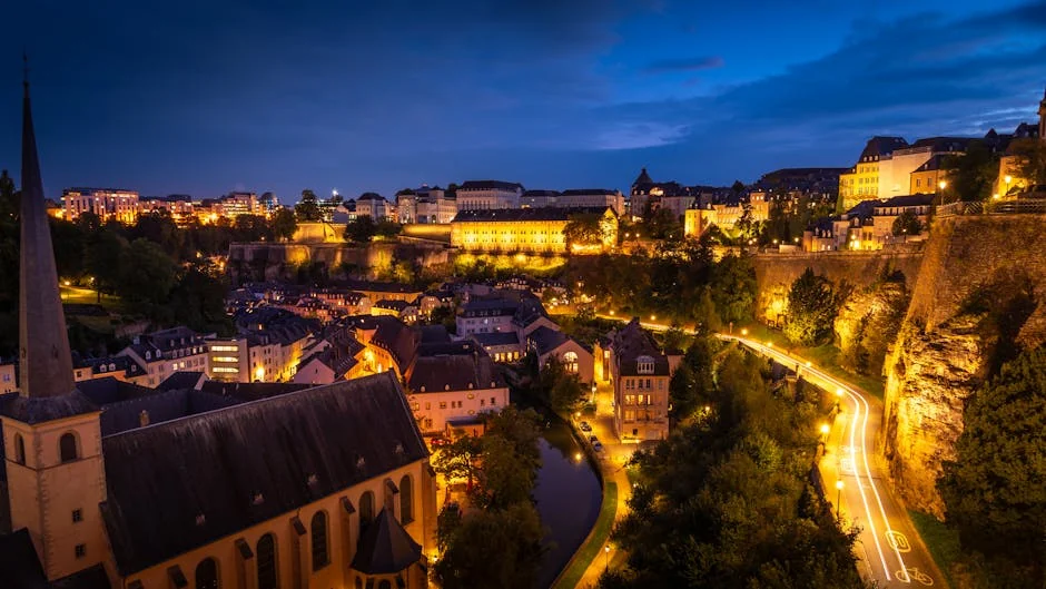 Discover the enchanting city lights of Luxembourg captured in a blue hour cityscape. - iptv europe