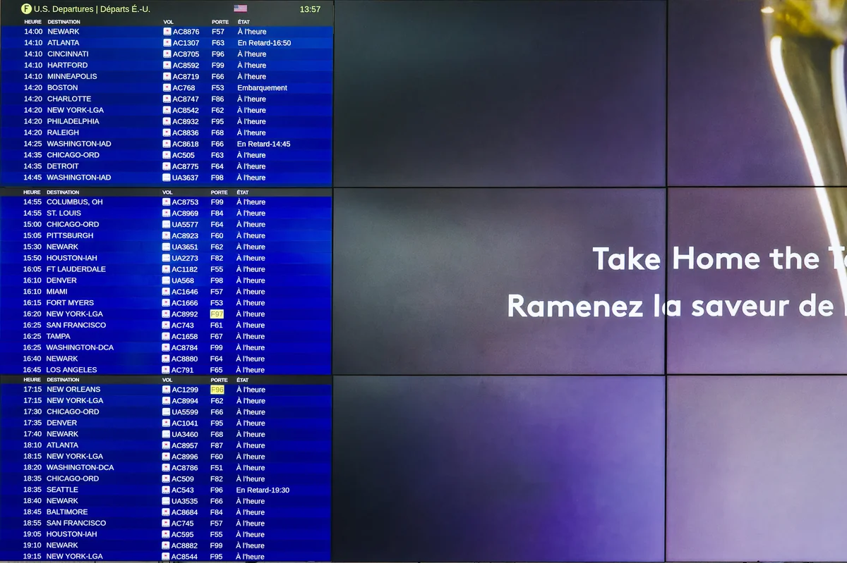 Airport Departure Board With Take Home the Taste Advertisement - A close-up shot of an airport departure board showing various flight times and destinations with an advertisement for Take Home the Taste with a French translation below it. The advertisement is partially - iptv list