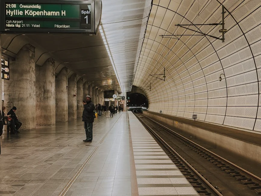 Captured in Malmö, a modern underground station with commuters waiting for the next train to Copenhagen. - iptv livego swedish
