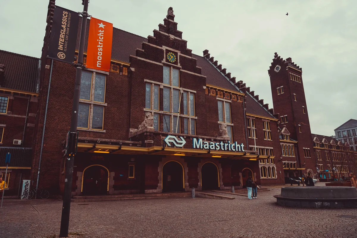 a large brick building with a sign on the front of it - iptv netherlands