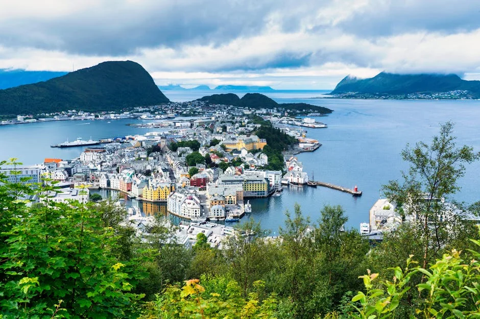 A breathtaking aerial view of Ålesund, Norway, showcasing its vibrant harbor and surrounding landscapes. - iptv nordic