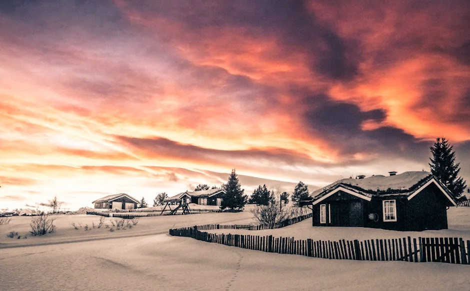 Captivating sunset over snowy village in Hol, Norway, showcasing winter beauty. - iptv nordic